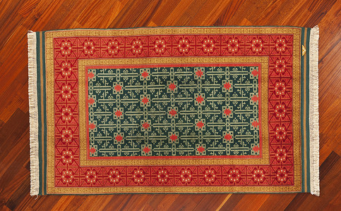 土地毯古董织物丝绸小地毯编织红色羊毛纺织品艺术挂毯背景图片