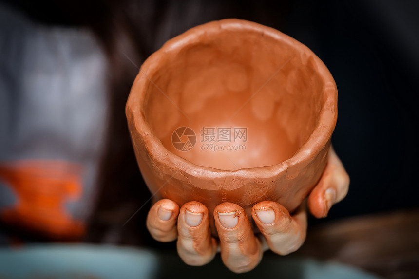 手制的波特工艺艺术工匠手指模具车轮陶器手工制品设计师图片