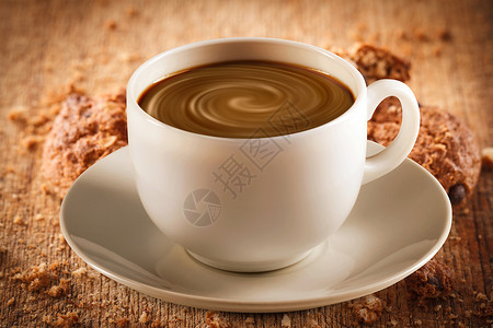 巧克力液体木本底的热巧克力可可咖啡店白色红色杯子早餐牛奶液体食物背景