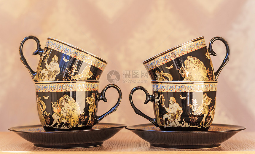 美丽的茶杯和酱汁古董传统东西蓝色商品飞碟餐具目的陶瓷制品图片