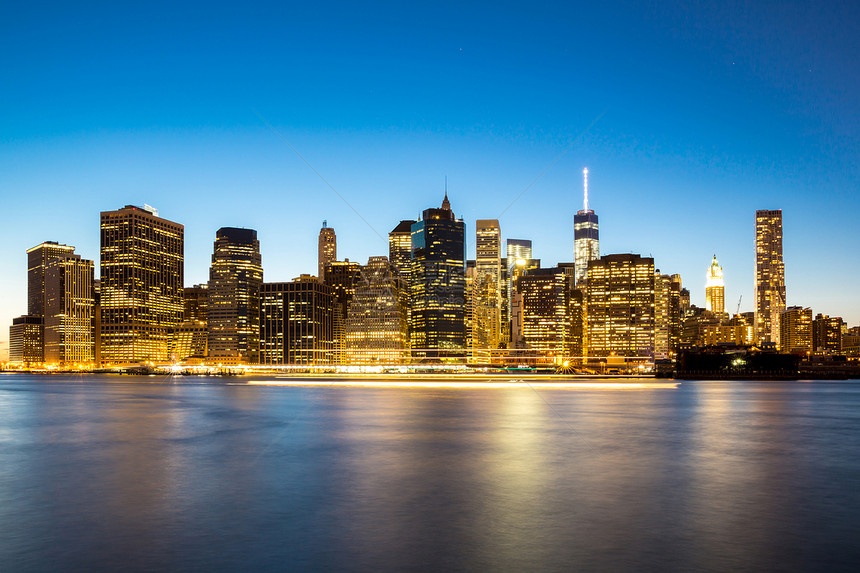 纽约市曼哈顿天际商业摩天大楼帝国景观金融建筑学都市反射办公室码头图片