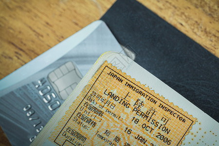 日本护照印章签证和旅行概念的信用卡检查员移民授权旅游风俗假期签名游客邮票背景图片