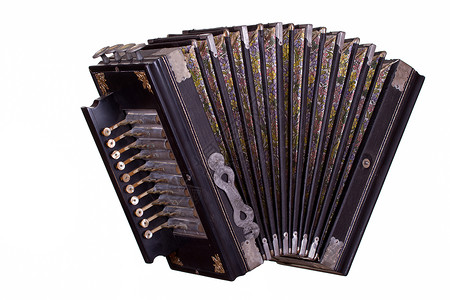 古老的手风琴白色文化尘土乐器古董钥匙艺术民间旋律口琴背景图片