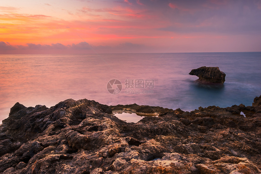 早晨落基海滩地平线日落场景风景岩石反射石头海景海岸海洋图片