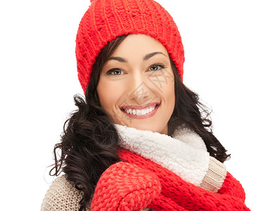穿着帽子 毛衣和手套的美女快乐围巾女孩福利青少年季节成人微笑女性羊毛背景图片
