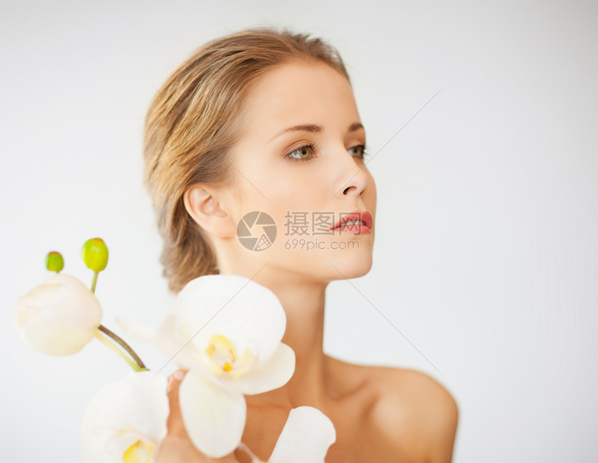 有兰花花的美女女孩植物兰花皮肤容貌青年护理女性活力卫生图片