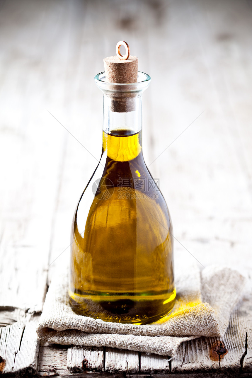 瓶装新鲜橄榄油瓶子玻璃乡村亚麻软木香气植物纺织品食物水果图片
