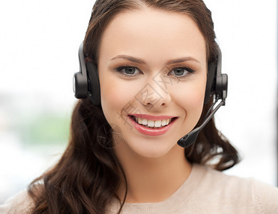 友好女性求助热线接线员顾客接待员微笑耳机工人技术快乐中心女性女孩手机高清图片素材