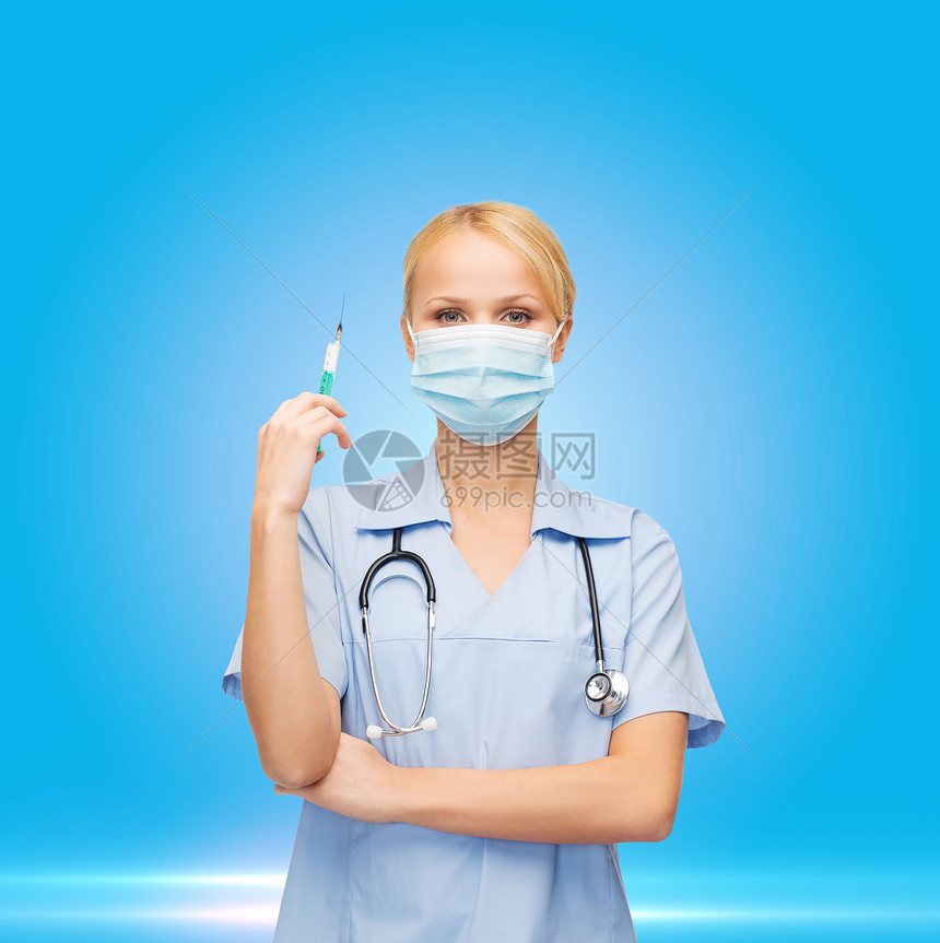 戴着注射器面具的女医生或护士剂量蓝色药品援助外科胰岛素女性女士程序疫苗图片