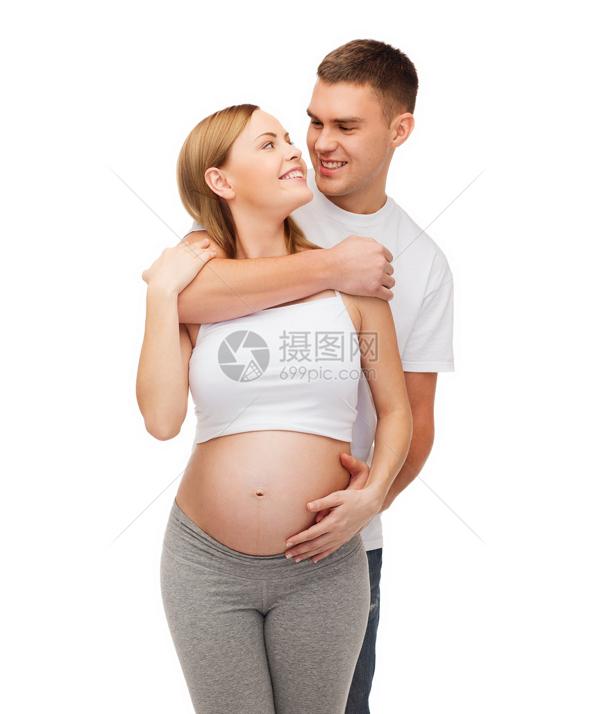 幸福的年轻家庭预产期子女婴儿生活丈夫女性身体拥抱女士孩子父亲怀孕图片