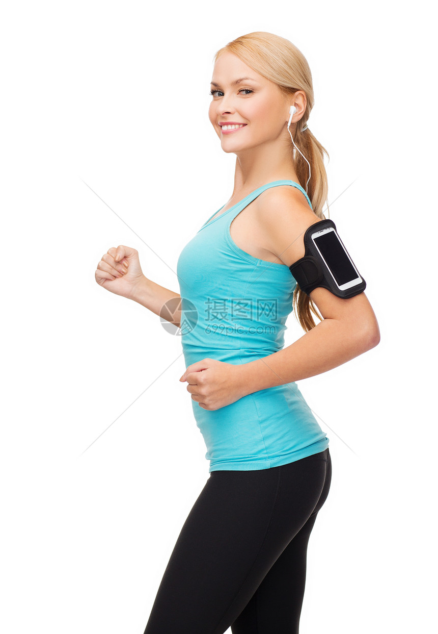 运动妇女用智能手机和耳机奔跑身体减肥音乐播放器损失赛跑者微笑玩家歌曲慢跑者耐力图片