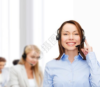 办公室方便女性求助热线接线员团体聊天微笑帮助技术手机工人耳机商业顾问会议高清图片素材