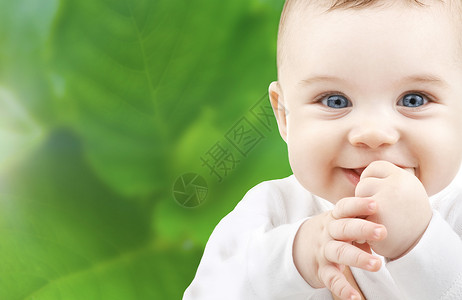 可爱可爱的宝贝微笑孩子蓝色男生男性婴儿生活情感婴儿期童年手高清图片素材