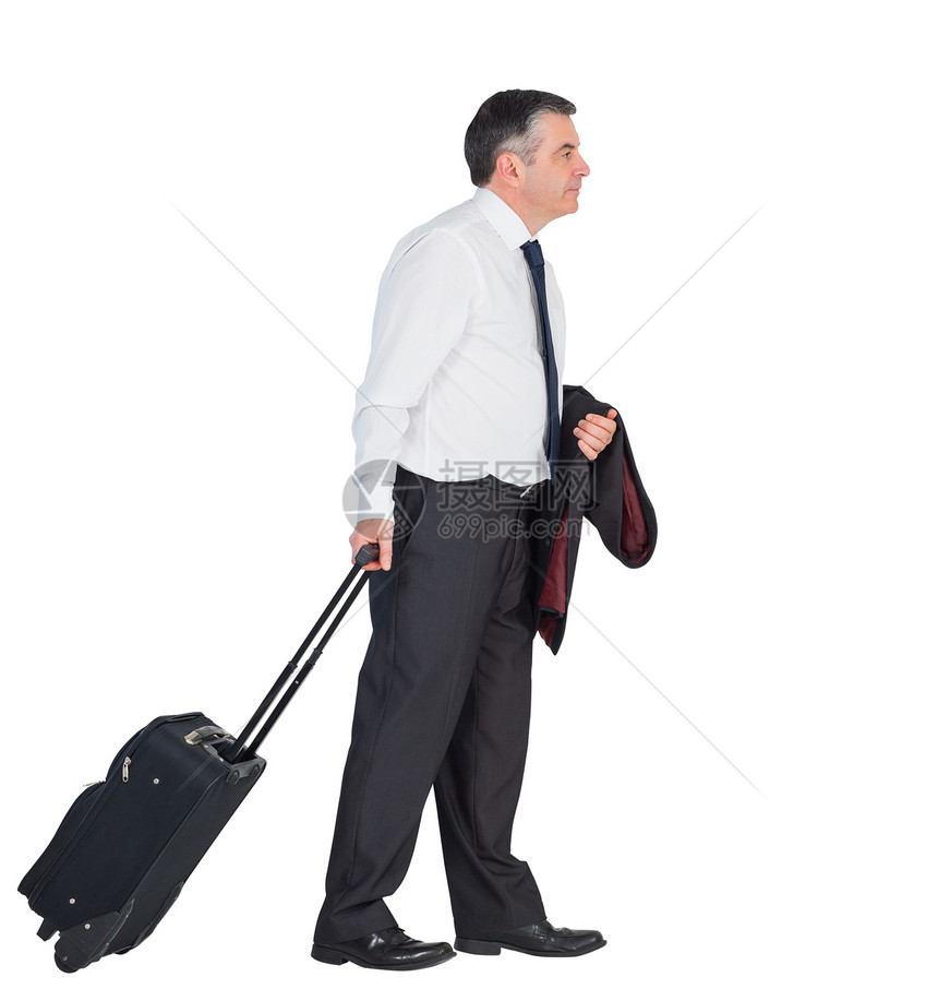 成熟的商务人士拉着他的手提箱商务行李旅行公司游客男性职业套装衬衫夹克图片