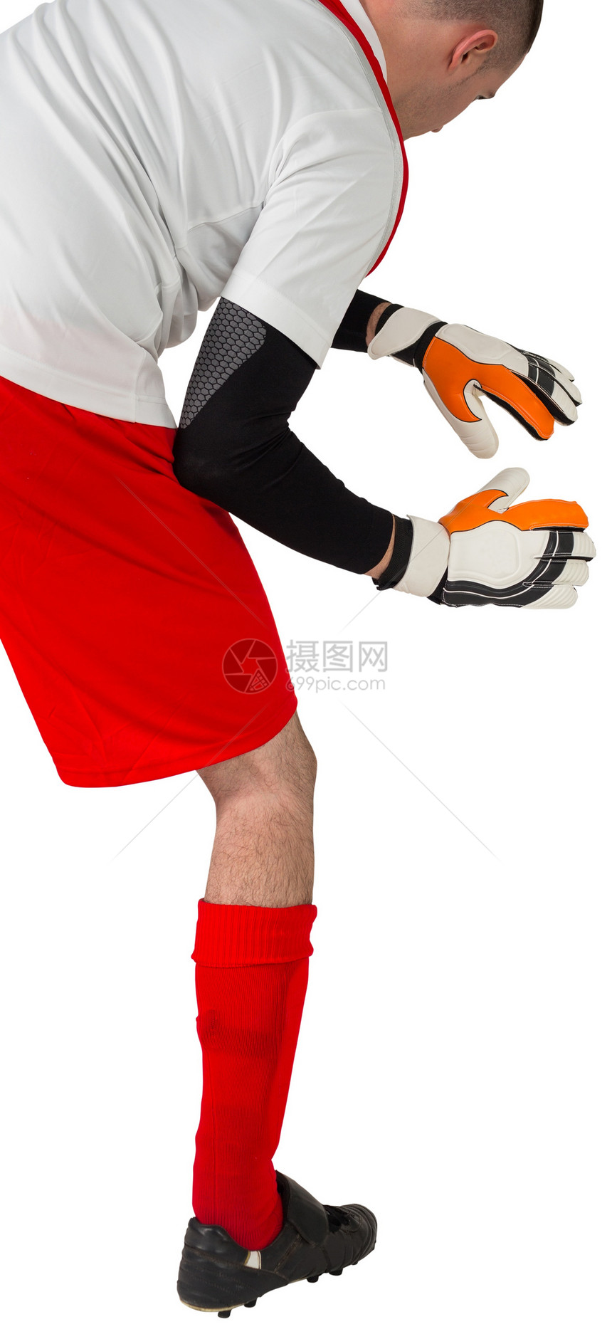 红白的守门员准备接球齿轮运动服男人播放器红色男性活动运动运动员足球图片
