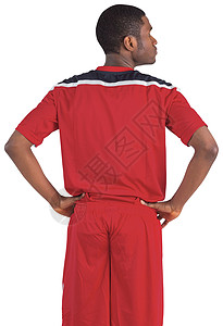 穿球衣的运动员穿红球衣的英俊足球运动员播放器黑色活动运动服男性齿轮男人运动背景