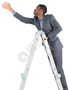 商务人士攀登阶梯梯子公司专注职业黑色商业进步商务人士男人背景图片