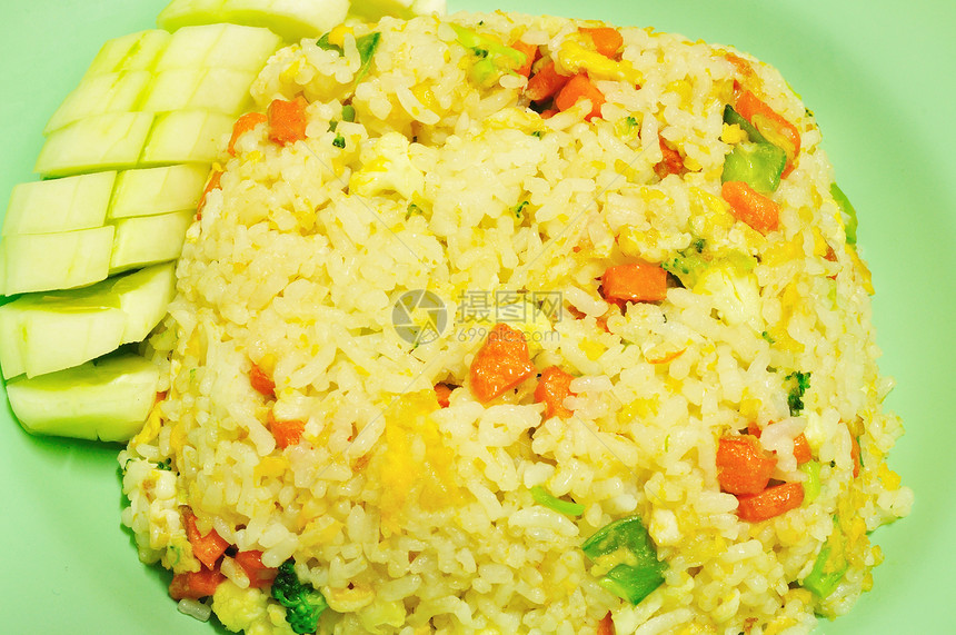 炒米饭泰式油炸美食照片谷物猪肉纤维早餐蒸汽饮食洋葱图片