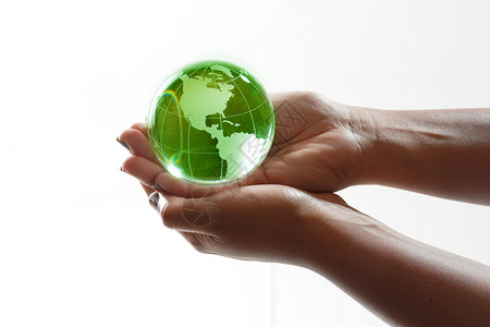 世界掌握在手中玻璃对象绿色女性行星业务摄影人类棕榈全球背景图片