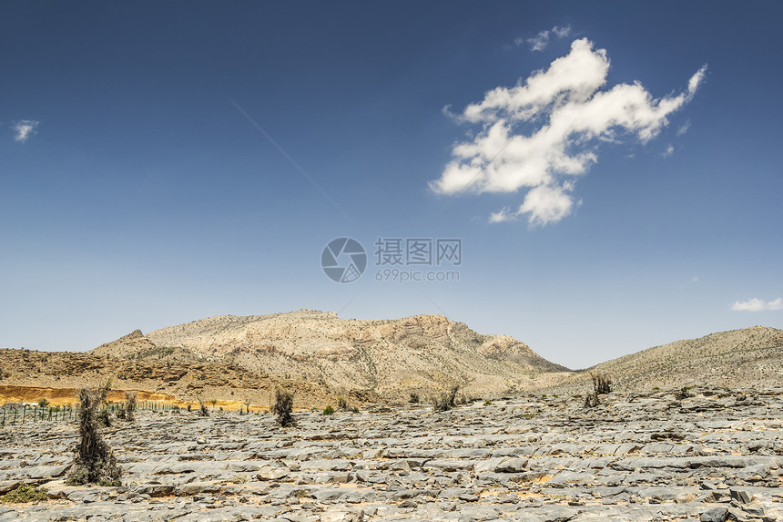 阿曼荒野峡谷旅行骨折丘陵踪迹冒险沙漠地质学旱谷图片