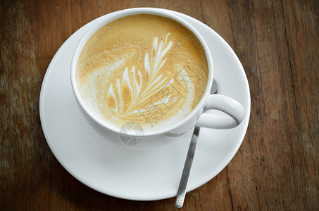 Cappucino咖啡杯时间牛奶饮料早餐休闲桌子勺子咖啡咖啡店香气背景图片