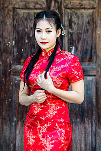 中华女子在传统的中国青桑祝福下女士文化女性服装女孩幸福裙子微笑新娘广告背景图片