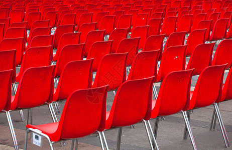 红椅子会议座位音乐会会议室娱乐办公家具背景图片