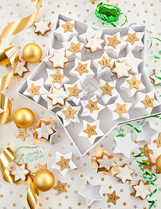 使用 cookie 的入场量值日历佳节星形白色丝带礼物盒糖果玩具时候星星背景图片