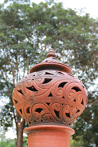 泰国陶器灯艺术品棕色模具装饰艺术民间风格装饰品两极背景图片
