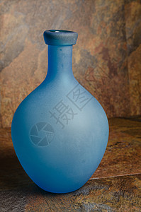 蓝瓶瓶子岩石玻璃石头背景图片