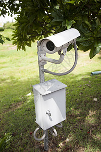 闭路电视电子白色记录花园视频草地监视器公园警卫相机凸轮高清图片素材