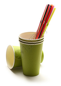 绿纸杯稻草杯子阴影早餐派对液体白色宏观机动性绿色背景图片