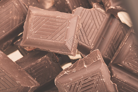 牛奶巧克力片食品纯牛奶巧克力蛴螬甜点紧身裤口粮蛋糕食物减肥背景图片