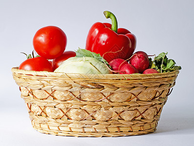 蔬菜篮菜篮子萝卜篮子蔬菜绿色红色背景图片