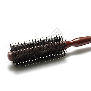 使用过的梳子发刷水平理发师黑色理发店宏观头发马夫工具发型背景图片
