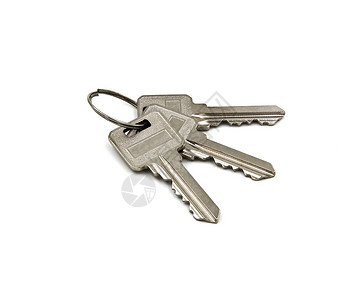 白背景上孤立的密钥钥匙安全白色金属房子宏观工作室背景图片