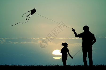 父亲和儿子带风筝男人玩具快乐闲暇幸福游戏插图日落节日女孩背景图片