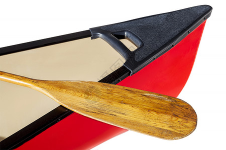 带桨的红色独木舟运动木头白色娱乐背景图片