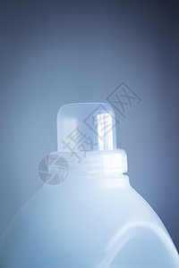 瓶式清洗液体洗涤液清洁剂近身产品包清洗液化工容器摄影塑料液体影棚卫生瓶子零售背景图片