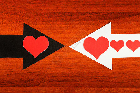 心脏形状和箭头团体指针桌子活动一体化手工联盟会议浪漫红色背景图片