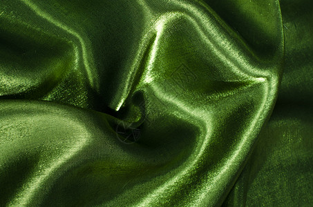 绿色丝织织物布料金子材料奢华丝绸背景图片