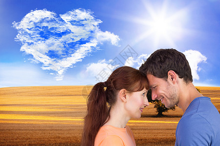 情侣互相看对方的复合图像拥抱亲热情感蓝色男性天空女性亲密感闲暇绘图浪漫的高清图片素材