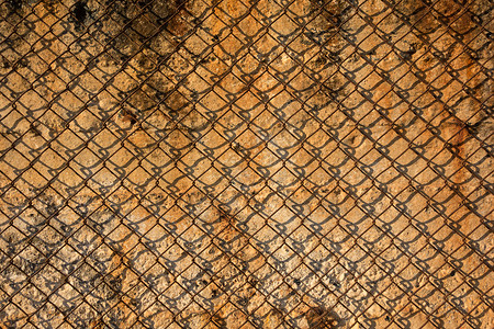 金属生铁丝网水泥金属材料栅栏橙子墙纸削片石头岩石水平背景图片