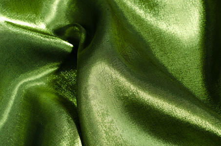 绿色丝织材料织物布料奢华金子丝绸背景图片