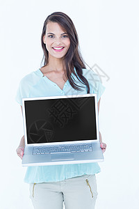 美丽的女士展示她的笔记本电脑背景图片