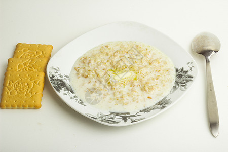 碗里煮粥饼干食物早餐稀饭黄油乡村美食产品营养饮食背景