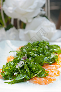 新鲜鲑鱼卡帕西奥橙子小吃沙拉海鲜盘子午餐跳跃叶子烹饪食物火箭高清图片素材