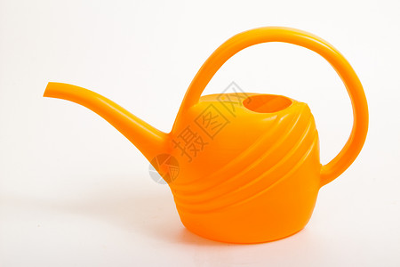 水罐白色园艺牛角喷口橙子工具背景图片