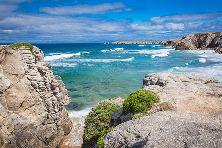 Quiberon半岛西侧的海洋支撑悬崖海滩海浪岩石海岸海岸线背景图片