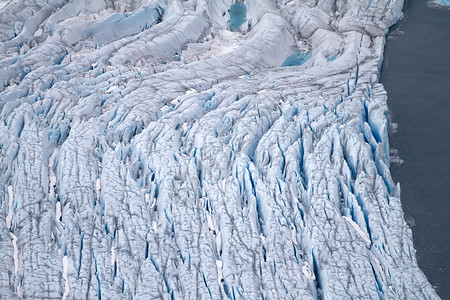 新泽姆利亚北极冰河地区冰川场地冰窖生态气候荒野破坏反射岩石旅行冰川作用高清图片素材